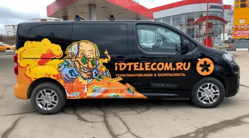 Рекламный автомобиль оклеенный нами пример