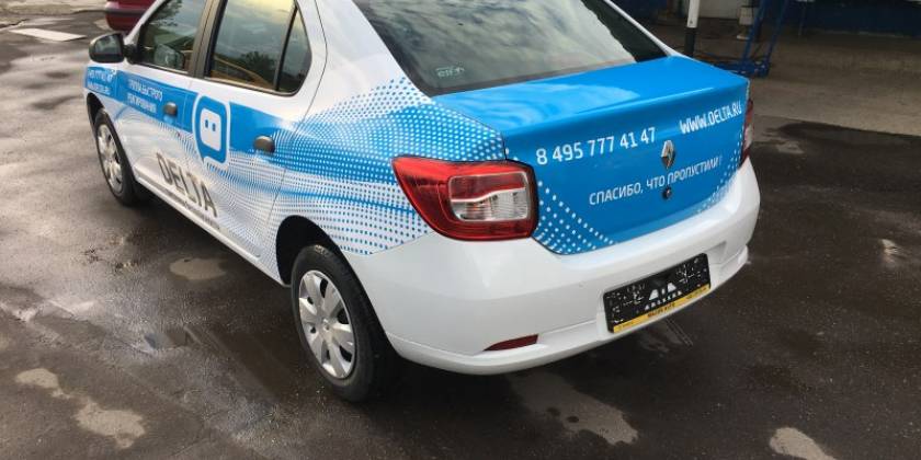 Оклейка рекламной пленкой автомобиля Renault