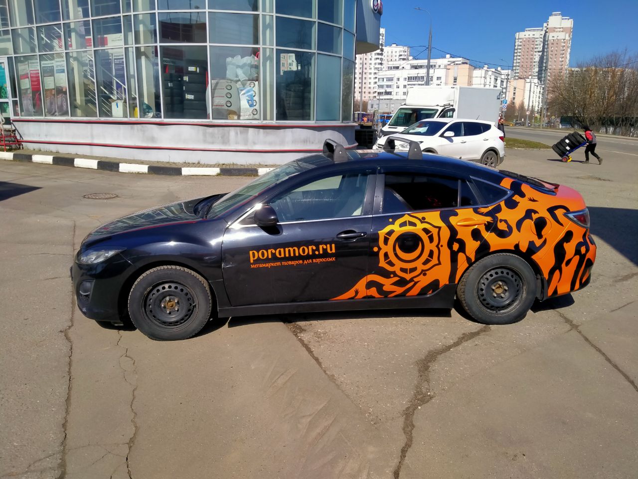 Пример оклейки автомобиля пленкой после завершения работ