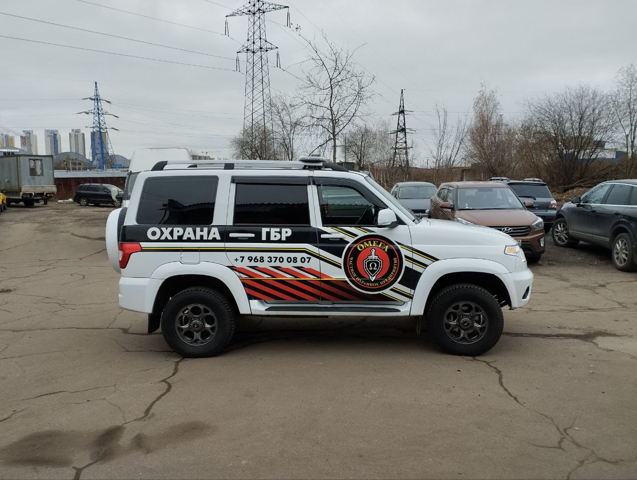 Брендирование УАЗ Патриот для ЧОП Омега