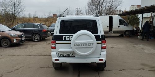 Брендированный автомобиль охранной компании: ЧОП Омега — УАЗ Патриот