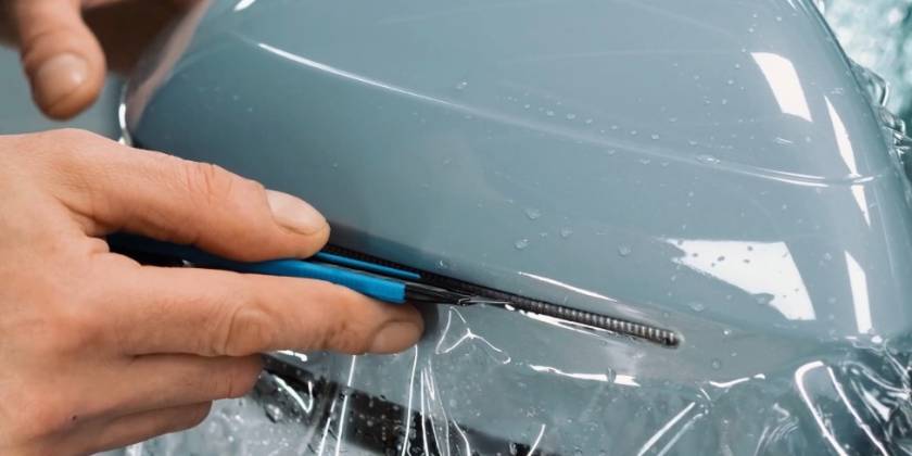 Оклейка Exeed виниловой и полиуретановой плёнкой: что выбрать