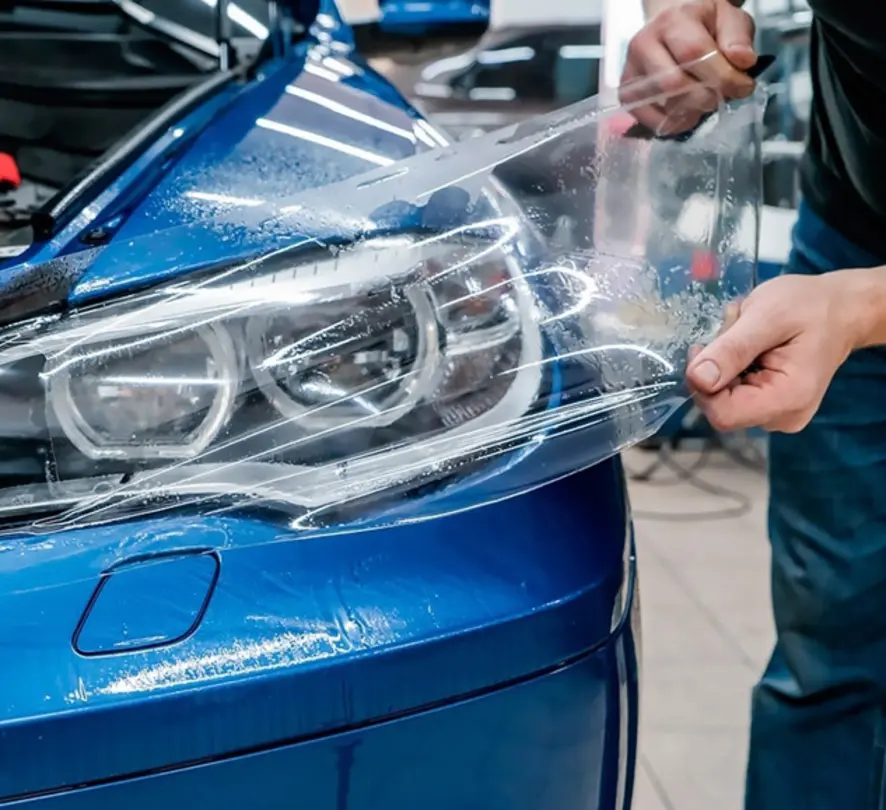 Оклейка фар автомобиля защитной полиуретановой плёнкой в Creative Team Print